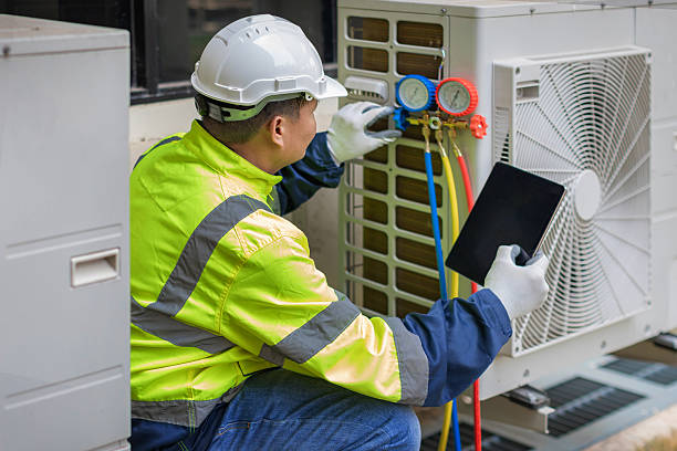 Professional Hvac technician working in Basom, NY